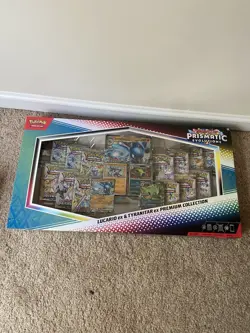 PRISMATIC EVOLUTIONS LUCARIO & TYRANITAR PREMIUM COLLECTION SAMS CLUB EXCLUSIVE - Image 1