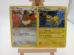 Eevee 83/108 & jolteon 37/108 - Dark Explorers - LP Pokemon Cards, 2012 - Image 1