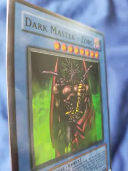 Used Dark Master - Zorc (DCR) super rare Yugioh card (creased) - Image 2