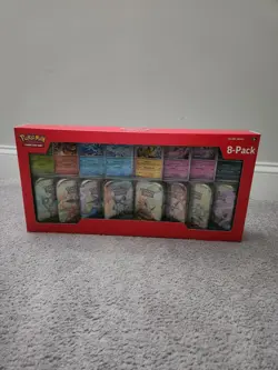 Pokemon TCG: Scarlet & Violet - Prismatic Evolutions 8 Pack Mini Tin Set - Image 1