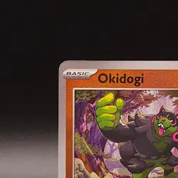 Pokemon English: Prismatic Evolutions 057/131 Holo Okidogi (Master Ball Pattern) - Image 2