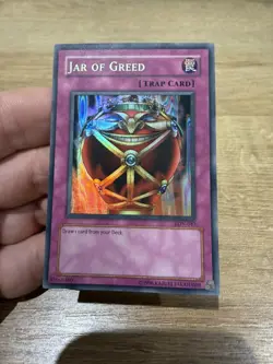 LON-EN047 Jar Of Greed Super Rare Unlimited Edition Yugioh Card NM - Image 1