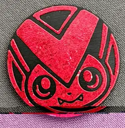 Pokemon TCG Glitter Holo Red Victini Flip Coin - Image 1
