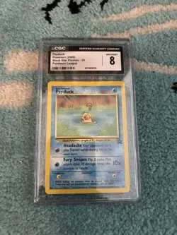 CGC old label 8 Psyduck Black Star Promo 20 - Pokemon League 2000 WotC - Image 1