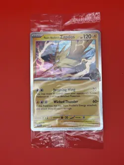 Pokemon Destined Rivals Team Rocket Zapdos GameStop Promo 070/182 Sealed In Hand - Image 1
