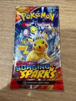 Pokemon Surging Sparks Booster Pack - 10 Cards / Pack - Random Art - SEALED - Image 1