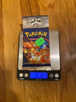 HeavyU Pokemon Base Set Sealed Blister Pack Charizard Art - Image 1