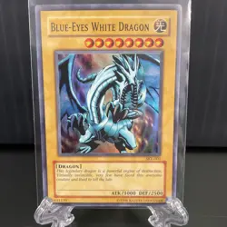 YUGIOH BLUE EYES WHITE DRAGON SUPER RARE SKE-001 1996 HOLO *Played* - Image 1