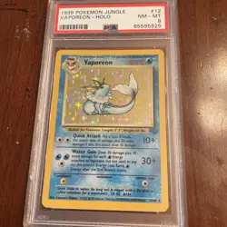 1999 Pokemon Jungle Vaporeon Holo 1st Edition 12/64 PSA 8 NM-MT - Image 1