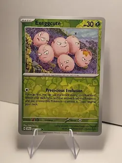 Exeggcute 001/191 Sv08: Surging Sparks Reverse Holo Pokemon TCG NM - Image 1