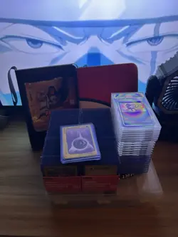 Pokemon Slabs, Pokemon Binder, And Box Full Of Naruto Pokemon Yugioh - Image 1