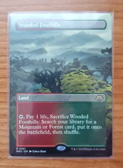 MTG Wooded Foothills (NM) - (Borderless, Regular) MH3 - Image 1