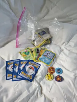 pokemon cards, variety set of cards, mostly common, and some cute buttons - Image 1