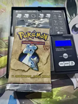 Rare Pokemon Unlimited Fossil Set Sealed Long Crimp Booster Pack 20.99 Grams. - Image 1