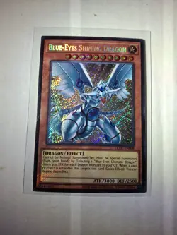 Yugioh! Blue-Eyes Shining Dragon LCKC-EN008 Secret Rare Unlimited NM - Image 1