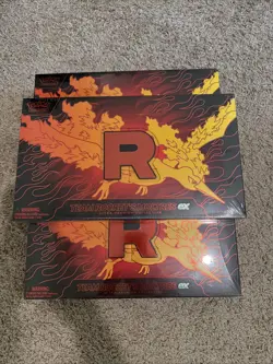 Pokemon TCG Team Rocket’s Moltres EX UPC Sealed In Hand - Image 1