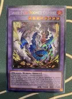 Snake-Eyes Doomed Dragon Secret Rare SUDA-EN035 Near Mint 1st Ed Yu-Gi-Oh! - Image 1