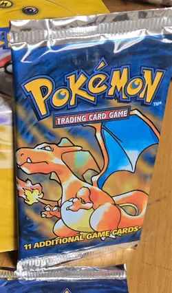 Pokemon Base Booster Pack English Unopened Unweighed Charizard Art - Image 1