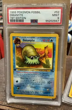 1999 Pokemon Fossil 1st Edition Omanyte PSA 9 Mint Card 52/62 WOTC Vintage Vtg - Image 1