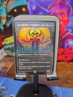 Sheoldred, the Apocalypse (Textured Foil) Dominaria United Foil - Image 1