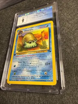 1999 Pokemon Fossil 1st Edition Omanyte 52/62 CGC 9 Mint - Image 2