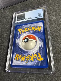 1999 Pokemon Fossil 1st Edition Omanyte 52/62 CGC 9 Mint - Image 4