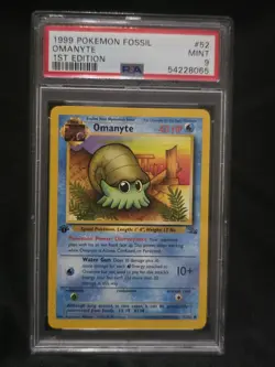 1999 Pokemon Fossil 1st Edition Omanyte Card PSA 9 Mint 52/62 WOTC Vintage - Image 1