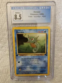 1999 FOSSIL 1st Edition POKEMON 49/62 #49 HORSEA CGC 8.5 - Image 1