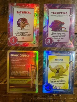 4 Holofoil Doomlings Cards -1st Ed- Satyrical, Terrifying, Ichor, Bionic Crutch - Image 1