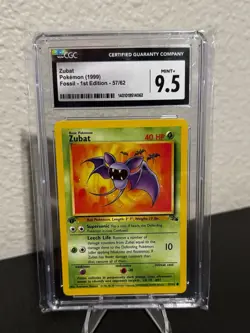 1999 POKEMON FOSSIL 1ST EDITION #57/62 ZUBAT - CGC Graded 9.5 Near Mint - Image 1