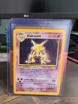 Pokemon Alakazam TCG Card 1/130 Base Set 2 Holo Unlimited Rare - Image 1