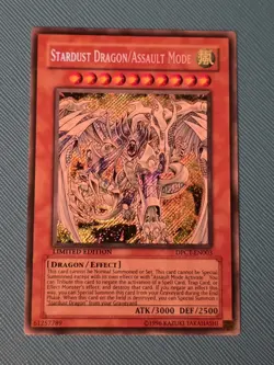 YGO Stardust Dragon/Assault Mode Secret Rare LP Duelist Pack Tin DPCT-EN003 - Image 1