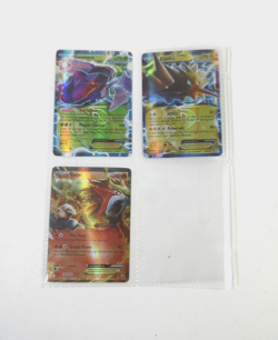 3x Pokemon Cards Holographic EX in Binder Page, Genesect, Zapdos, Entei, 2012 - Image 1