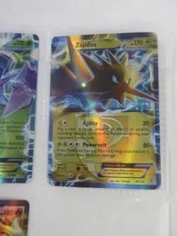 3x Pokemon Cards Holographic EX in Binder Page, Genesect, Zapdos, Entei, 2012 - Image 4