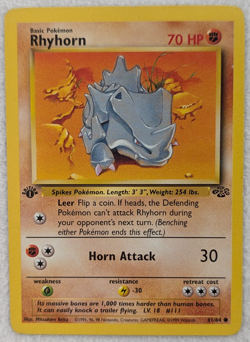 1999 Rhyhorn #61 Jungle Regular Pokemon Card Common 1st Edition - Image 1