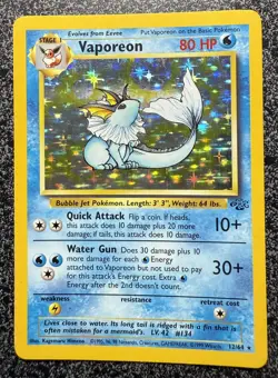 Pokemon TCG Jungle Vaporeon Holo Card 12/64 Unlimited Rare LP/NM Condition - Image 1