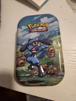 Pokemon Trading Card Game Riolu Tin ONLY - Image 1