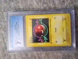 CGC 7 NM Voltorb 1st Edition Base Set Shadowless 67/102 Pokemon 1999 Non-Holo - Image 1