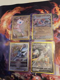 Holo Rare Mew, Arceus, And Greninja Metal Promotional Cards - Image 1