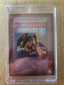 "Authentic Yu-Gi-Oh Card Singles" "Thousand Dragon MRD-143" Magnet Case - Image 1