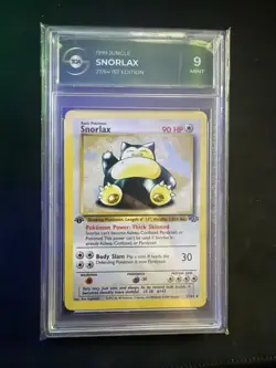 Pokemon Snorlax 1999 Jungle 1st Edition Non-Holo #27 TGA 9 - Image 1