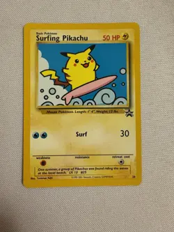 2001 Pokemon Surfing Pikachu Non-Holo WOTC Black Star Promo #28 - Pokemon League - Image 1