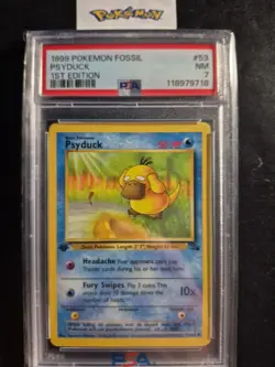 First Edition 1999 Pokemon Fossil 53/62 Psyduck PSA NM 7 - Image 1