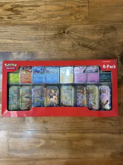 Pokemon TCG Prismatic Evolutions 8 Mini-Tins with Promo Cards, Costco - Image 1
