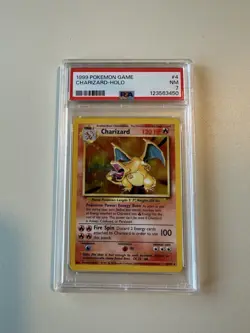 1999 Pokemon Base Set Unlimited Charizard-Holo Card PSA 7 - Image 1