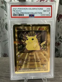 Pikachu 58/102 Gold Metal 2021 Celebrations UPC PSA 8 NM-MT Pokemon Card - Image 1