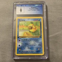 Psyduck 53/62 1st Edition CGC 9 Pokemon Fossil - Image 1
