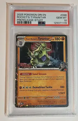 Pokemon 2025 Dri-Destined Rivals Prerelease Staff Team Rocket's Tyranitar PSA 10 - Image 1