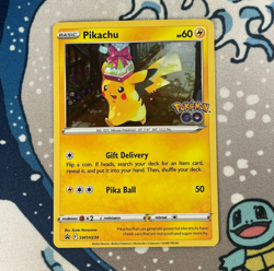 Pikachu SWSH234 Black Star Promo Holo Pokemon Go Stamped Pokemon Card 2022 LP - Image 1
