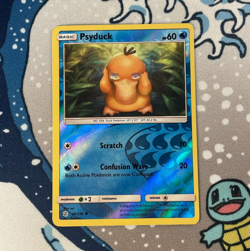 Psyduck 40/236 Reverse Holo Sun & Moon Cosmic Eclipse Pokemon Card 2019 NM - Image 1